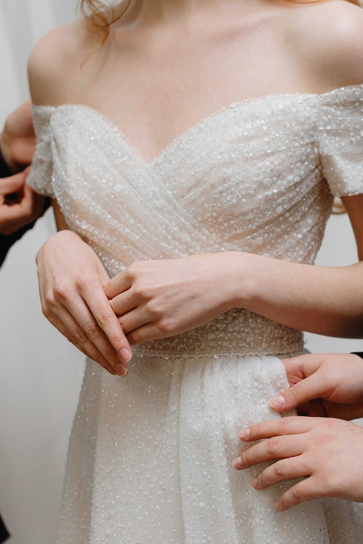 How to Keep Your Wedding Dress Perfectly in Place All Day